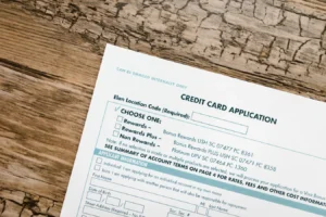 Top view of a credit card application form, relevant to credit cards for horrible credit