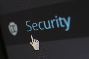 Mouse cursor hovering over digital security text on screen for enterprise password manager access