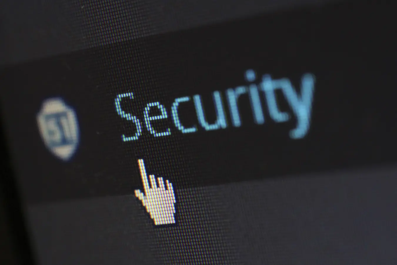 Mouse cursor hovering over digital security text on screen for enterprise password manager access